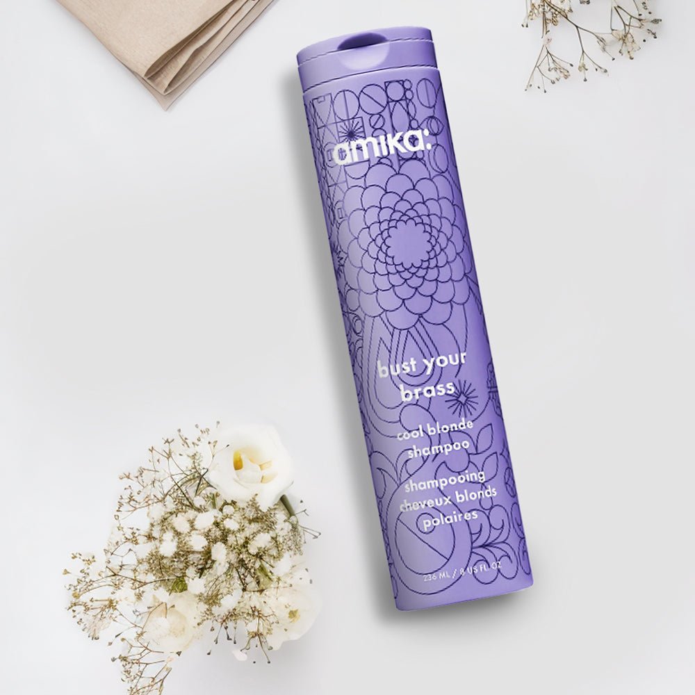 Amika Bust Your Brass Cool Blonde Repair Shampoo 10.1 oz - James S Geidner Inc